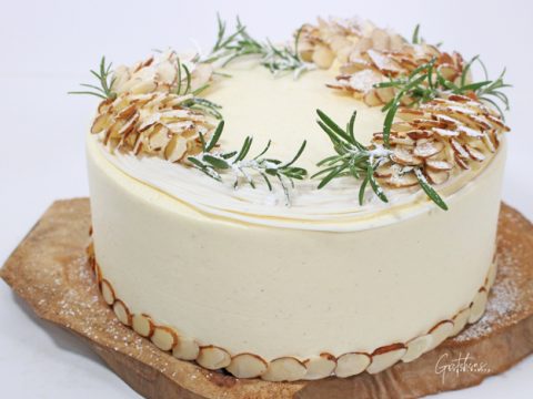 https://www.gretchensveganbakery.com/wp-content/uploads/2023/11/white-christmas-cake-featured-resized-3-480x360.jpg